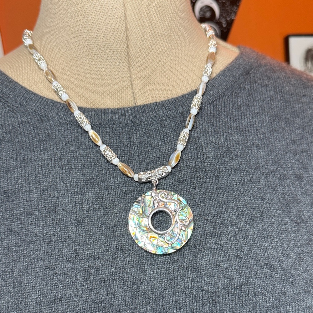 Elegant Silver and Abalone Pendant Necklace